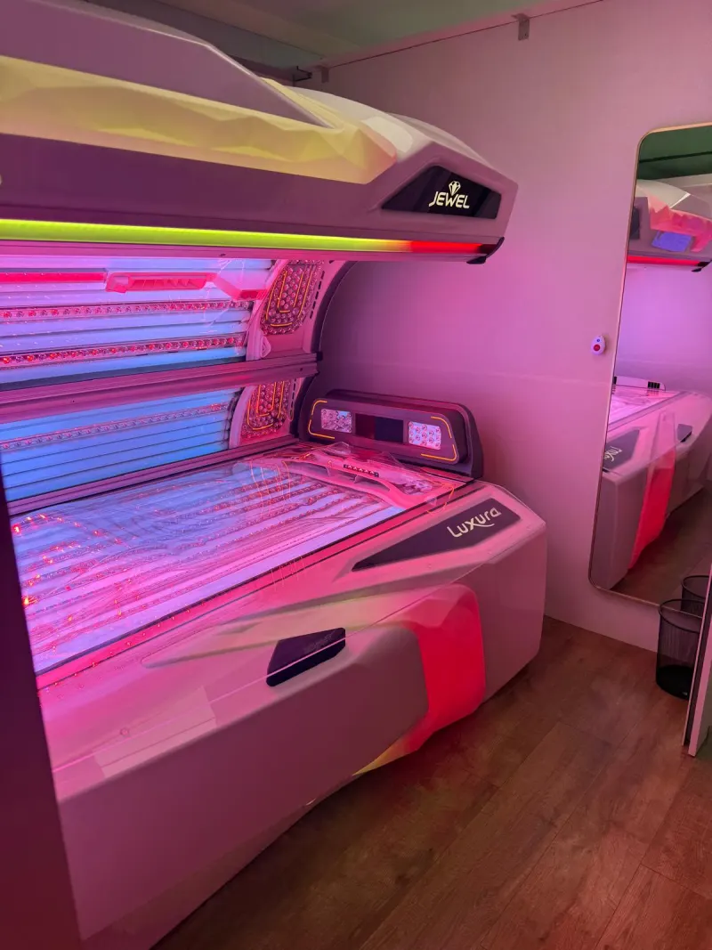 Hybrid laydown sunbed lit pink and red
