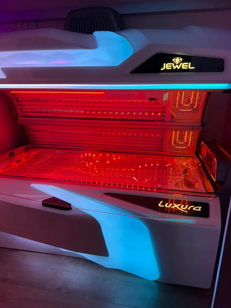 Hybrid LED laydown sunbed glowing red with blue accent lights
